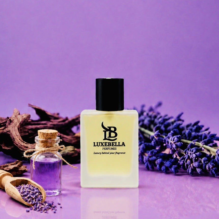 Luxebella Intense Lavender perfume bottle with a black cap and pale yellow liquid, styled on a purple surface with lavender sprigs, a small glass vial, and dried wood against a purple background.